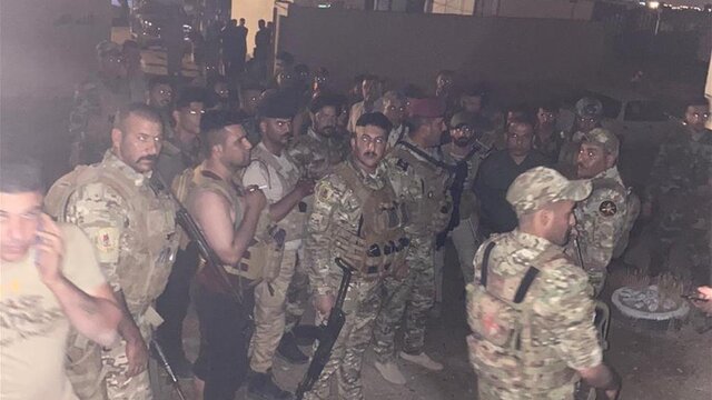 همبستگی معترضان عراقی با نیروهای امنیتی و حشد شعبی