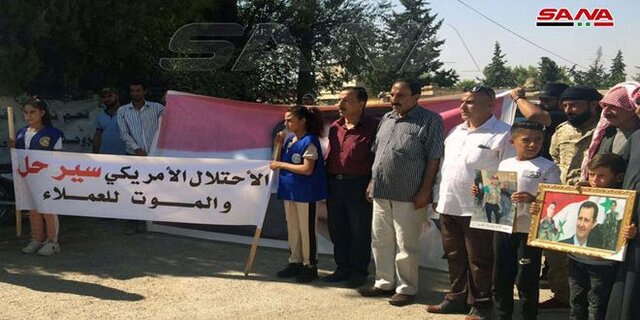 تظاهرکنندگان سوری پرچم آمریکا را آتش زدند تظاهرکنندگان سوری پرچم آمریکا را آتش زدند